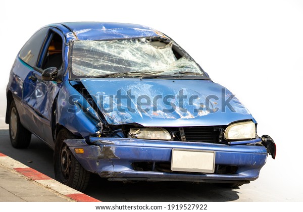 Accident of car isolated on white\
background, damaged\
automobiles.