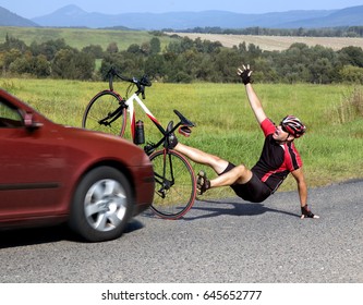 Accident cars with biker. Car collides cyclist on the road. Dangerous traffic on asphalt way on the countryside. Road crash misfortune car with a cyclist.  Careless driving. 