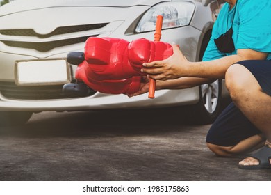 Accident Insurance Concept : Man Holding His Son's Stroller, Who Was Hit By A Car, Lost His Life In The Middle Of The Road : Carelessness, Lack Of Caution And Unexpected Accidents On The Road