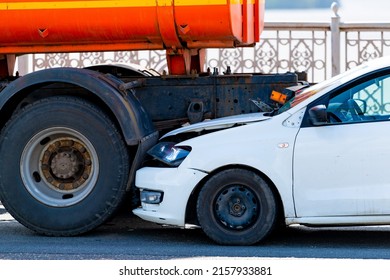 Accident Involving Two Cars On The Road, A Collision With A Truck In Rear End.