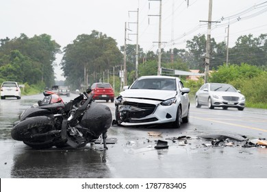 Accident With The Motocycle Or Big Bike And Car In  Bad Weather Driving With Falling Rain