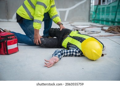 The accident occurred on work while the man was working in site. Safety team and first aid team are helping him. Please keep the Safety First. Safety team help employee accident.
