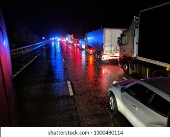 Accident On The Road At Night - Vehicles Queueing