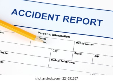 Accident report application form with pencil.