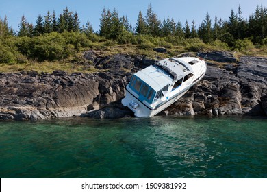 Accident At Sea; Photo Of Recreational Boat On Dry Land After Collision With Rocks