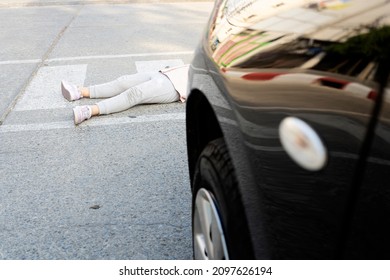 Accident. Small Girl On The Bicycle Is Hit By The Car. There Was A Minor Accident Where A Car Hit A Child At A Crosswalk.