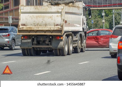          Accident Of A Truck And Car On A Large Urban Multi-lane Road.                      