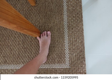 accidentally toe hitting table leg