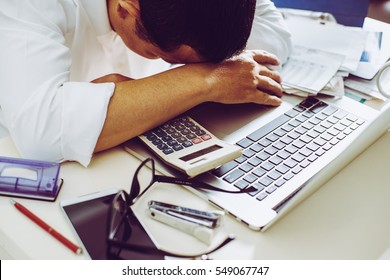 Accountant businessman working in office having a stress.