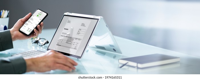 Accountant Checking Online Invoice On Tablet Screen