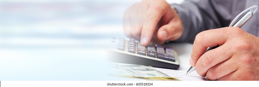 Accountant Hands With Calculator