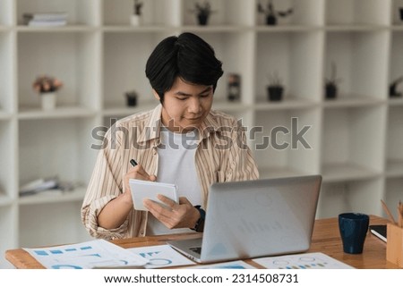 Accountant man working on laptop and do document, tax, exchange, research, accounting and Financial advisor concept