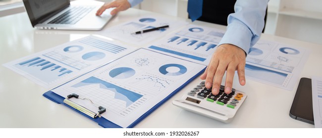 accountant reviewing data in financial statement. Accounting Business, Accountancy, Bookkeeping Concept. - Shutterstock ID 1932026267