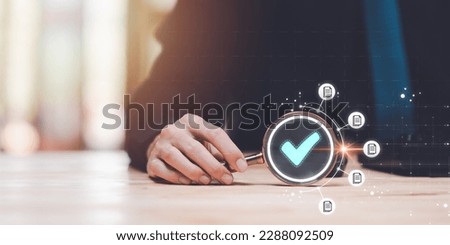 accountant showing an audit of documents with a magnifying glass, quality assessment management With a checklist, business document evaluation process, market data report analysis and consulting