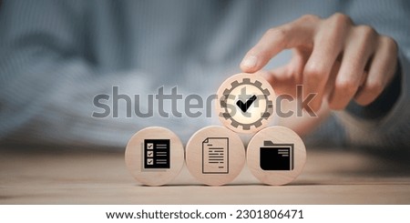 Accountant showing office document auditing concept ,plan review process and assess correctness ,Management of important document storage of organization ,document system ,accountant Audit documents