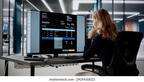 Accountant Using E Invoice Software At Computer In Office