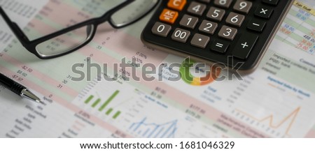 Accounting analysis businessman hand working Strategy Research analyzing financial data and charts