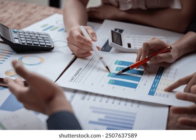 Accounting company provide finance and taxation planning for profitable cash flow, Auditor and accountant team working in office, analyze financial data and accounting record with calculator.Insight