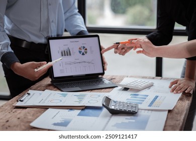 Accounting company provide finance and taxation planning for profitable cash flow, Auditor and accountant team working in office, analyze financial data and accounting record with calculator.Insight - Powered by Shutterstock