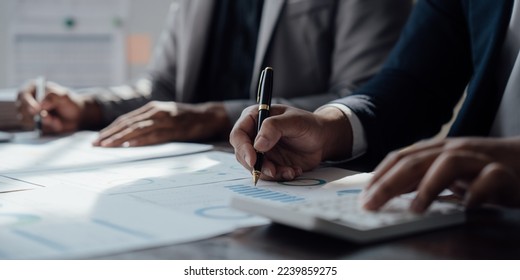 Accounting fund managers meeting to planning to improve quality next year team consultation investment stock market analysis and checking document, investigation of corruption account. anti bribery - Shutterstock ID 2239859275