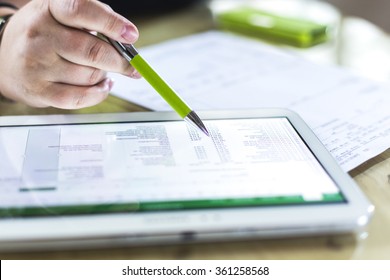 Accounting on a tablet computer, close-up - Shutterstock ID 361258568