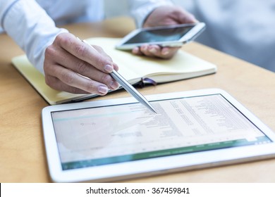 Accounting on a tablet computer, close-up - Shutterstock ID 367459841