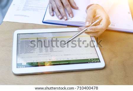 Accounting on a tablet computer, close-up