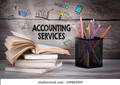 Accounting Services, Business Concept. Stack Of Books And Pencils On The Wooden Table