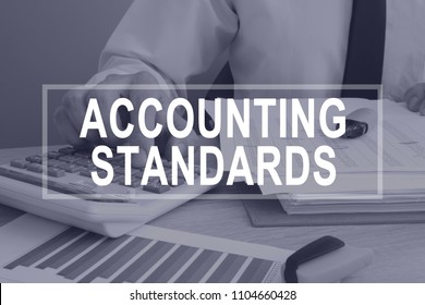 Accounting Standards Concept. Man Working With Report.