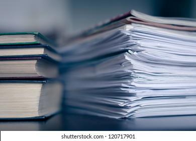 Accounting And Taxes. Large Pile Of Magazine And Books Closeup