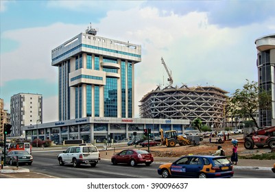 ACCRA, GHANA -JAN 9,2014: Development Of City Infrastructure In Africa. Construction, Building Frame, Scaffolding, New Shopping Mall. Economic Growth In West Africa. Urban Sprawl Construction Industry