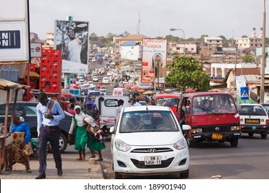 ACCRA, GHANA - MARCH 18: Traffic On Road In Accra, Capital City Of Ghana On March 18, 2014 In Accra, Ghana. Ghana Is One Of The Most Popular Tourists Destination In Africa.