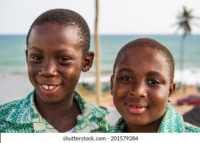 ACCRA, GHANA - MARCH 2, 2012: Unidentified Ghanaian friends smil for the camera. People of Ghana suffer of poverty due to the unstable economic situation