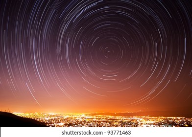 The Accumulated Star Trails In The Night Sky Above San Jose, California.