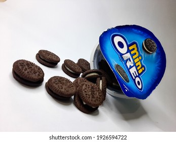 ACEH, INDONESIA - 28th FEBRUARY,  2021 - Mini Oreo With Original Flavor Variant, Spilling Over With Some Oreos On The Outside, On A White Background.