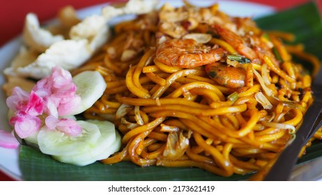 Aceh noodles (Mie Aceh) is a combination of yellow noodles with various vegetables that have many benefits. In addition, there is also additional shrimp which tastes good to increase appetite. - Shutterstock ID 2173621419