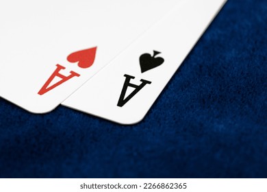 Aces on the blue table. Two aces on the poker table. Combination of two aces close-up