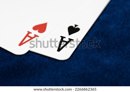 Aces on the blue table. Two aces on the poker table. Combination of two aces close-up