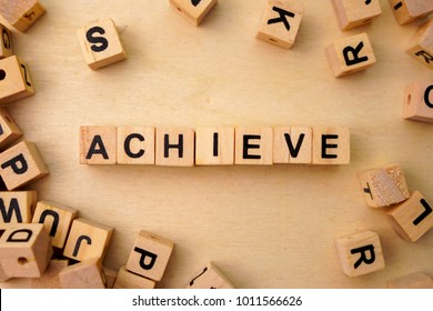 Achieve word cube on wood background