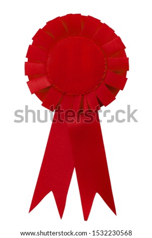 Achievement, certificate of quality and winner conceptual idea with red satin award ribbon with copy space on the fabric isolated on white background and clipping path cutout