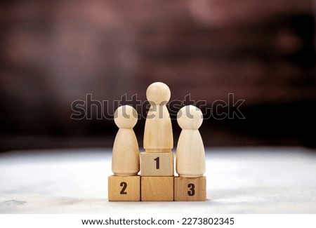 Achievement concept. Wooden podium 1, 2, 3, human standing on podium with ranking winner business and sport competition concept copy space space for text