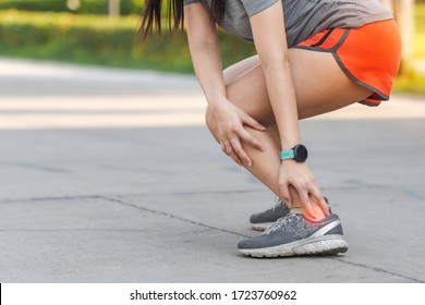 Achilles tendon tearing, a common running injury. pressure point. achilles tendon painful.