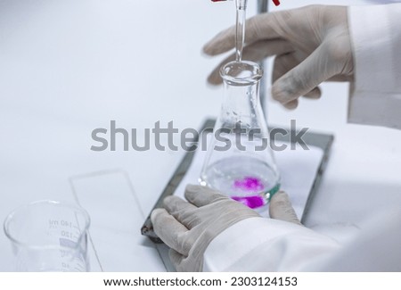 Acid-base reaction titration in Laboratory.