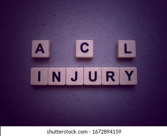 ACL Injury, Word Cube With Background.