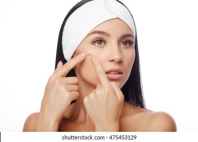 Acne treatment. Acne woman. Acne. Woman squeezing her pimple, removing pimple from her face. Woman skin care concept. Acne spot pimple spot skincare beauty care girl pressing on skin problem face.