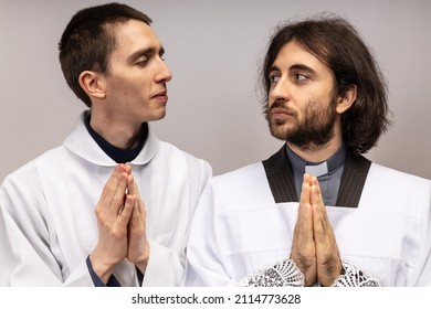 The Acolyte And The Clergyman Look At Themselves.