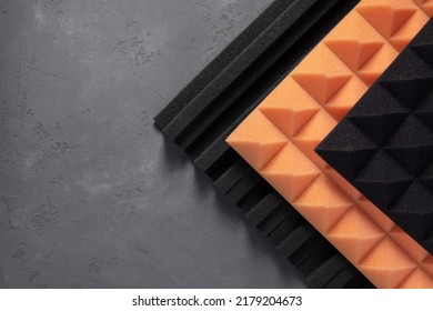 Acoustic foam material at concrete wall background texture. Foam rubber panel for record studio