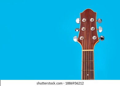 acoustic guitar with blue background