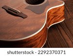 acoustic guitar bridge saddle nut on wood