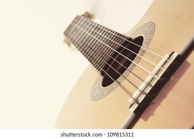 Acoustic Guitar Bridge And Strings Close Up